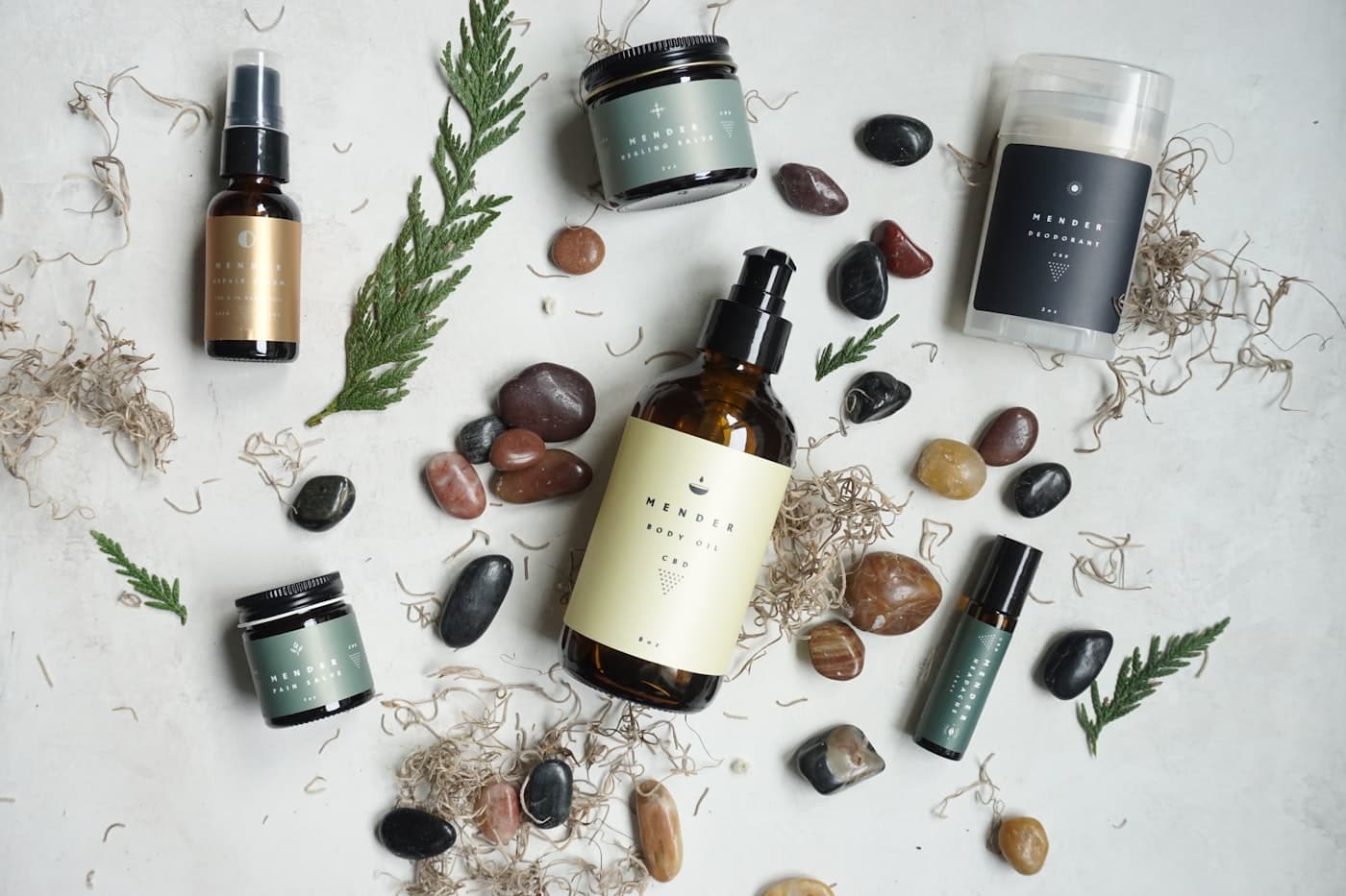 Skincare products and botanicals in natural light